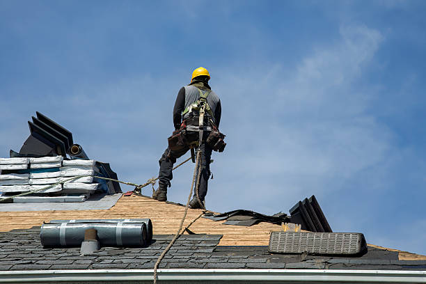 Professional Storm Damage Roof Repair technician working in Garrison, MT